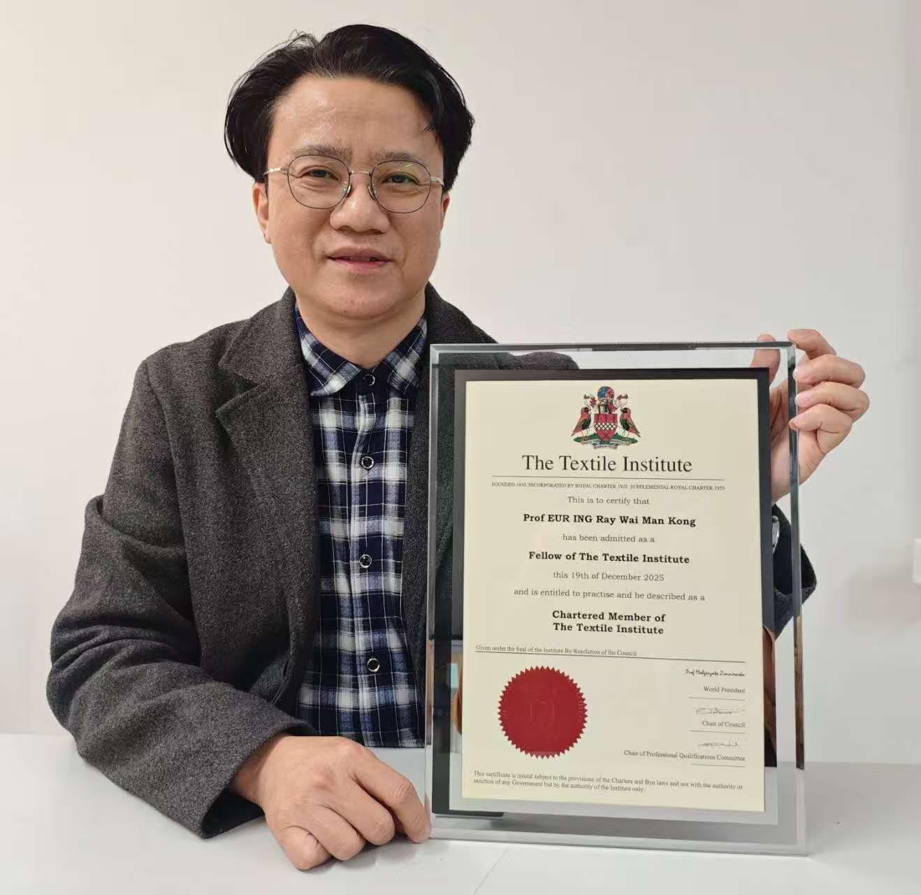 Chartered Fellow of the Textile Institute certificate